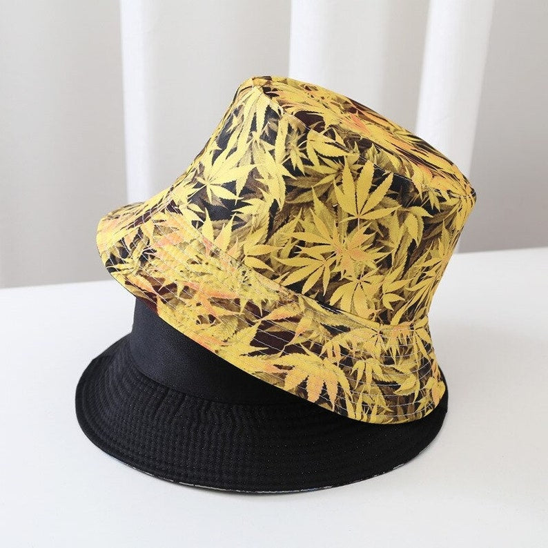 DOUBLE SIDED LEAVES PRINT BUCKET HAT